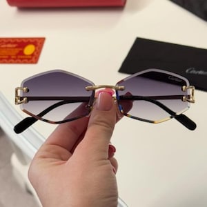 カルティエ グラデーションレンズ デザイナーリムレスサングラス