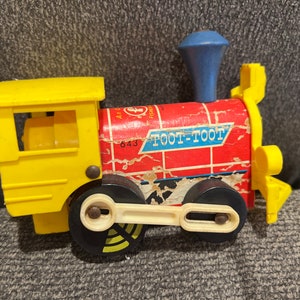 Antique toot toot Fisher-Price toy pull train