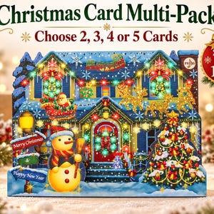 May include: A pop-up Christmas card featuring a house with a Santa sleigh, reindeer, and a snowman. The card displays the text "Christmas Card Multi-Pack", "Choose 2, 3, 4 or 5 Cards", "Save Up to 10%", "Merry Christmas & Happy New Year".