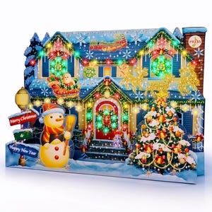 May include: A light-up Christmas house display featuring a snowman, a decorated tree, and Santa in a sleigh. The scene includes signs reading Merry Christmas & Happy New Year, with colorful LED lights, gold reindeer silhouettes, and a press button.
