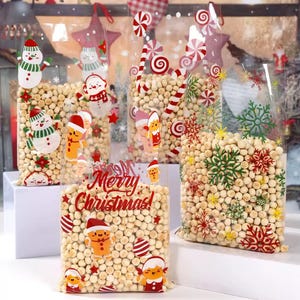 Christmas Candy Gift Bags with Santa, Snowman, Reindeer & Penguin Designs – Holiday Party Favor Bags for Treats and Gifts