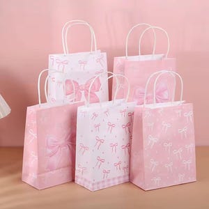 Pink Bow Party Gift Bags – Pink & White Paper Bags with Handles, Cute Bow Design, 20.5x15.5x7.7cm