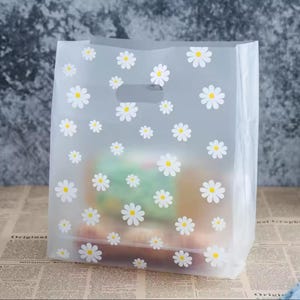 25/50個入りプラスチックデイジーグッディバッグ パーティー記念品バッグ ショッピングバッグ 誕生日ケーキ
