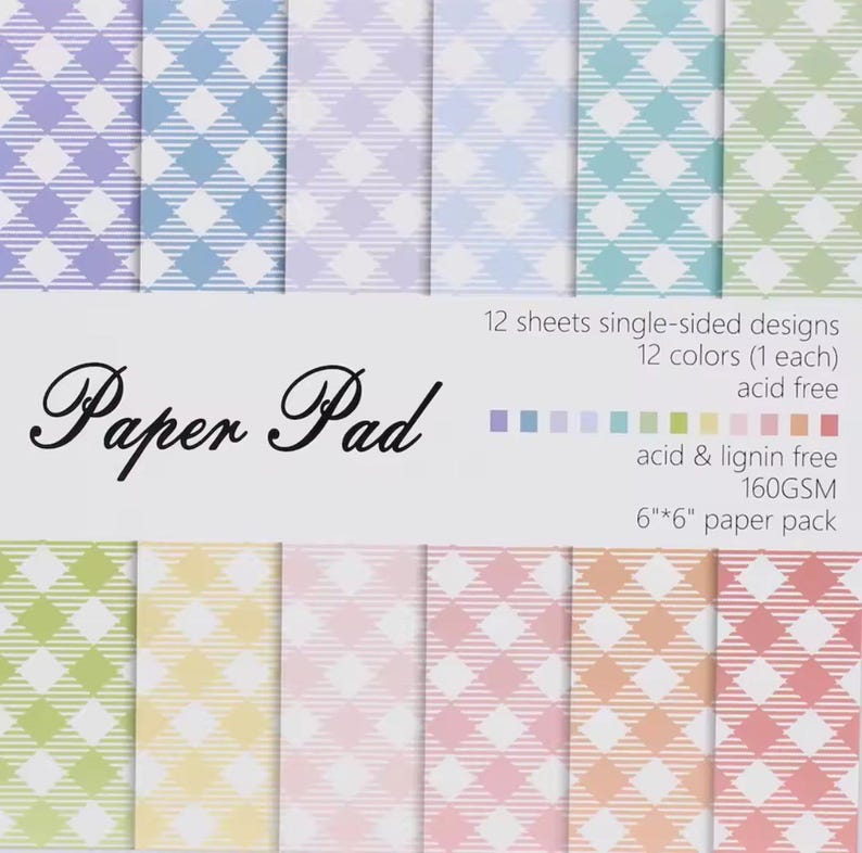 May include: A paper pad featuring twelve sheets of single-sided designs in twelve colors, each with a gingham pattern. The paper is acid and lignin-free, 6" x 6" in size, and 160GSM. The text "Paper Pad" is displayed in elegant script.