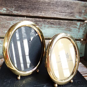 May include: A rustic wooden sign with the text "Welcome to our home" in white lettering. The sign features a distressed finish and a simple, inviting design, perfect for front door decor.