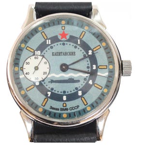 Molnija wristwatch. The blue dial is made in a marine style, the numbers are placed in a circle in the form of a steering wheel.