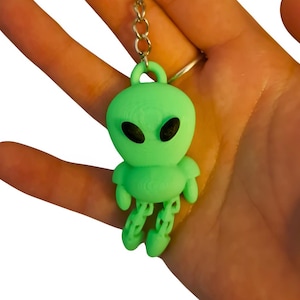 Articulated Alien Keychain: Neon Green Retro Sci-Fi Accessory