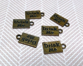 BULK 50 Drink me tag charms antique silver tone M95