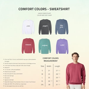 May include: A color chart for Comfort Colors sweatshirts. The image displays six different sweatshirt colors: white, pepper, blue jean, crimson, seafoam, and violet. A size chart is also included, with measurements in inches.