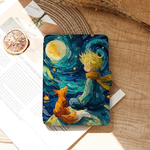 May include: A rectangular e-reader case featuring a vibrant, painterly illustration of a young person with blonde hair and a fox sitting together under a swirling, dark blue night sky with a bright yellow moon and scattered stars.