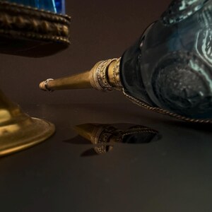 Pair of 1950s French Perfume Bottles | Blue Glass & Brass | Mid-Century Vanity Decor image 4