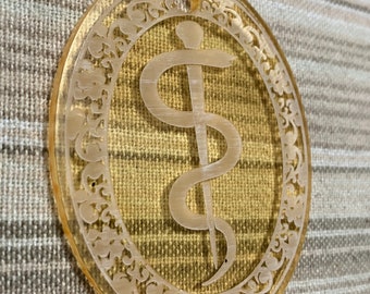 Light gold acrylic ornament with Rod of Asclepius