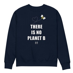 May include: Navy blue sweatshirt with a white bee flying with a heart-shaped trail and the text "THERE IS NO PLANET B".