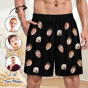 May include: Black shorts with a repeating pattern of faces and dog faces. The shorts have an elastic waistband and are made of a soft material. The text "1-10 Face Photos" is visible in the image.