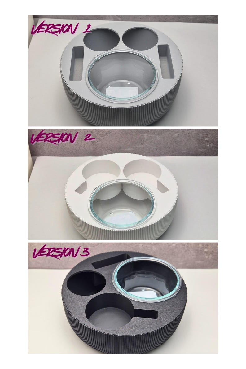 May include: A set of three round serving trays in different colors: gray, white, and black. Each tray has a central glass bowl and various compartments for holding items. The text "VERSION 1", "VERSION 2", and "VERSION 3" is visible.