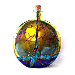 tree of life urn
colors-- light and dark blue
cork top