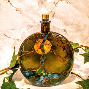 tree of life urn
colors-- blue and green
clear heart is out of stock