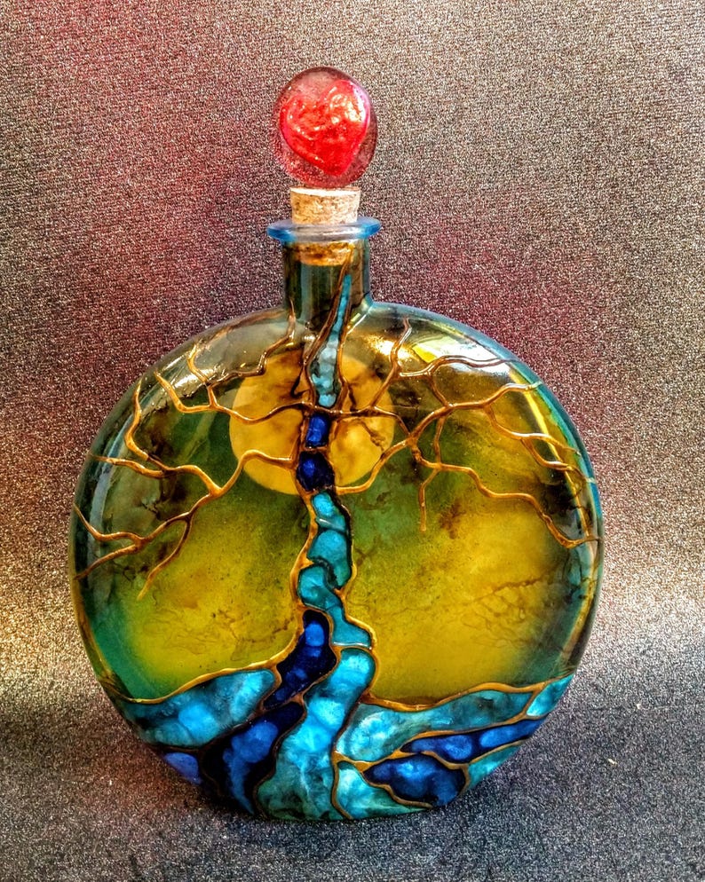tree of life urn
colors-- light and dark blue
red heart cork top