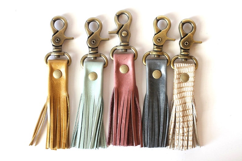 Leather Tassel Keychain Or Key Fob With Large Heavy Duty Antique Brass Clip. Select from suedes, metallics, prints and more! 