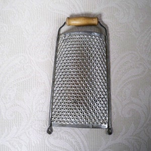 Vintage Large Kitchen Food Punched Metal Wood Handle Grater Loop Feet