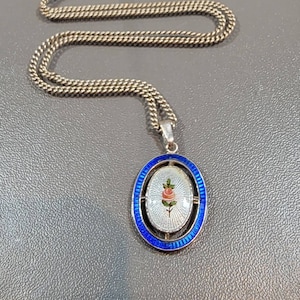 Antique necklace enamel pendant flower motif blue and white sterling silver