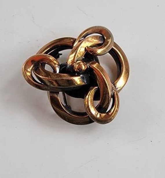 copper brooch mcm trinity design interlocking swi… - image 1