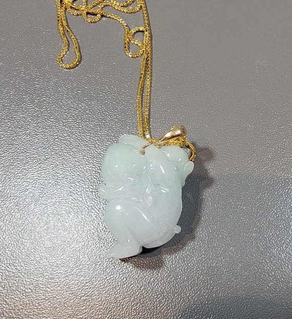 Jade pendant carved longevity monkey and peach 14 karat yellow gold