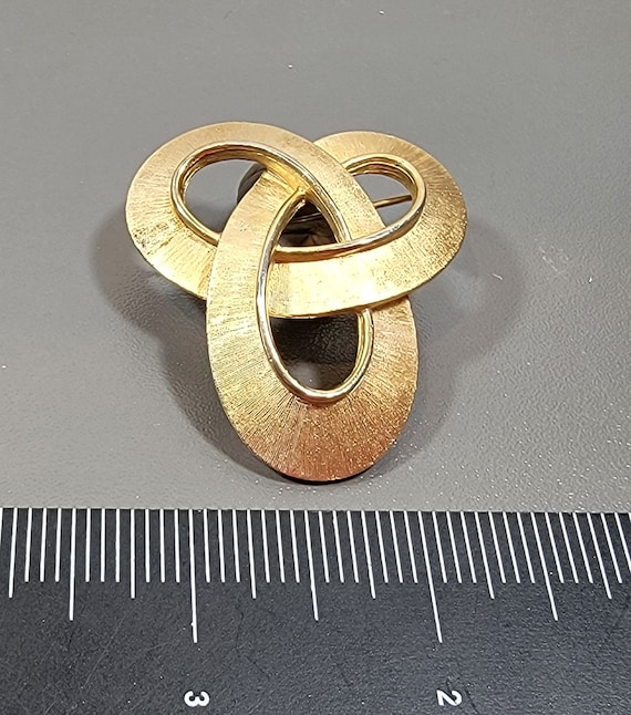 Trifari brooch trifarium gold tone fancy knot