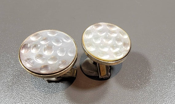 mother of pearl cufflinks round carved shell