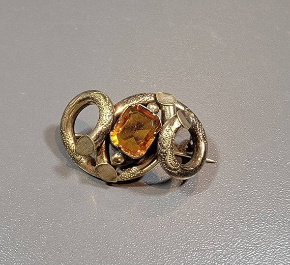 Victorian brooch rolled gold knot citrine glass stone