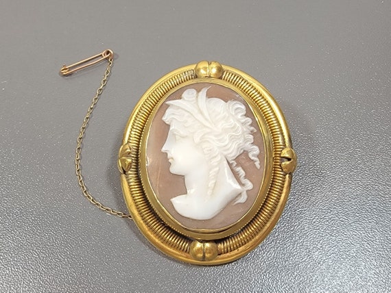 Antique Cameo goddess gold gilt swivel memento compartment
