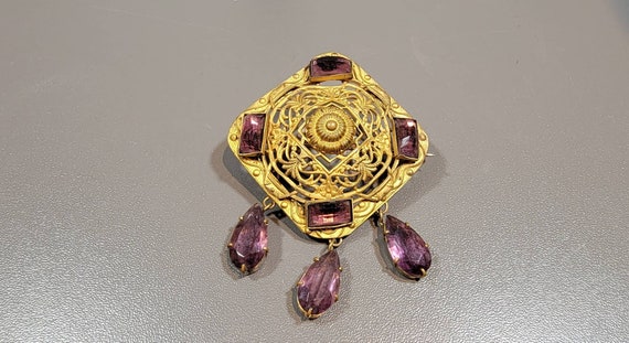 Victorian brooch Gold tone brass purple rhinestones dangle crystals