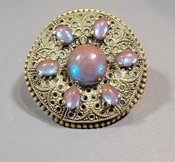 saphiret brooch large lusterous stones victorian revival style
