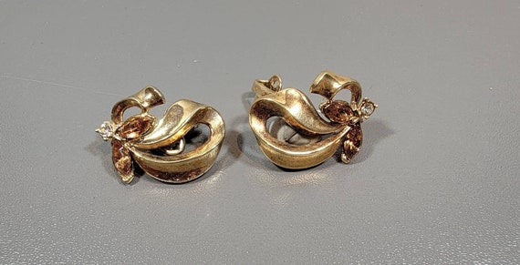 trifari earrings gold tone clip ons rhinestone accents