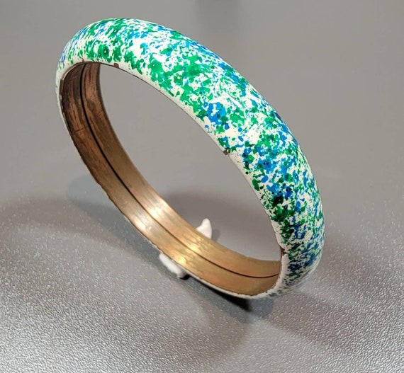 copper enamel bangle green blue white flecked design