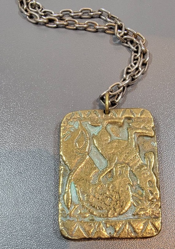 ancient style pendant heavy gold tone metal