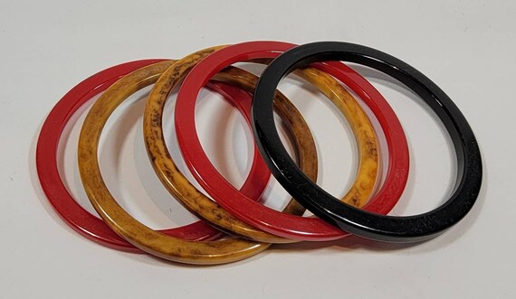 Bakelite bangle bracelets five spacers red black butterscotch marble vintage