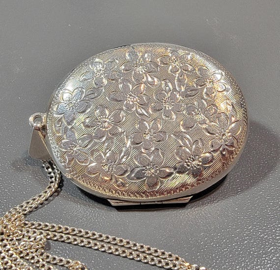 sterling silver locket engraved oval floral engraving room for memento