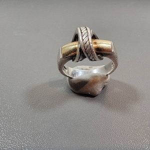 Modernist sterling silver ring big Bold shiny knot design with 18 karat details