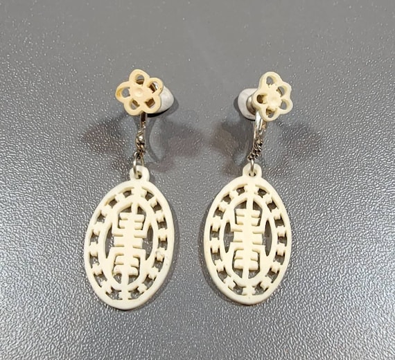 lucky earrings dangle drop screw back vintage white plastic