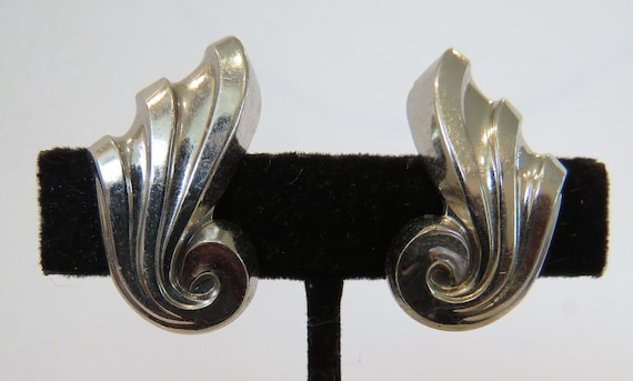 Retro earrings Bold silver tone metal swooping fe… - image 1