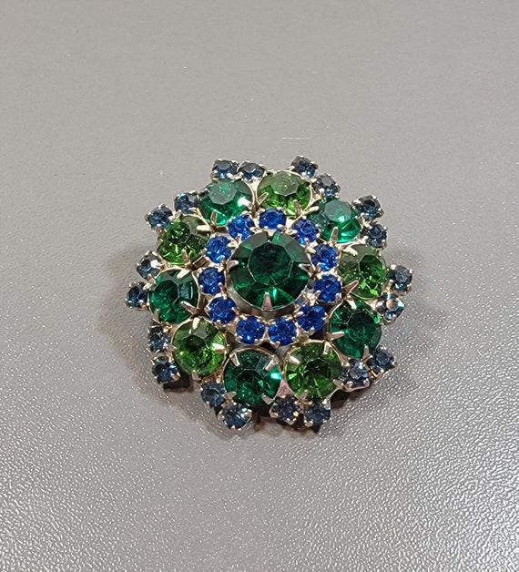 green and blue rhinestone brooch all prong set