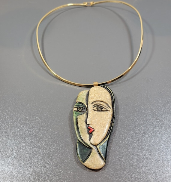 artsy necklace picasso style cubist faces plastic