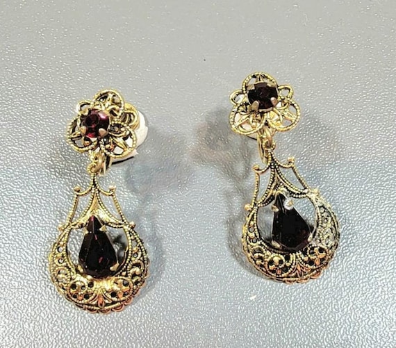 antique style earrings lacy filigree brass garnet glass stones screw on