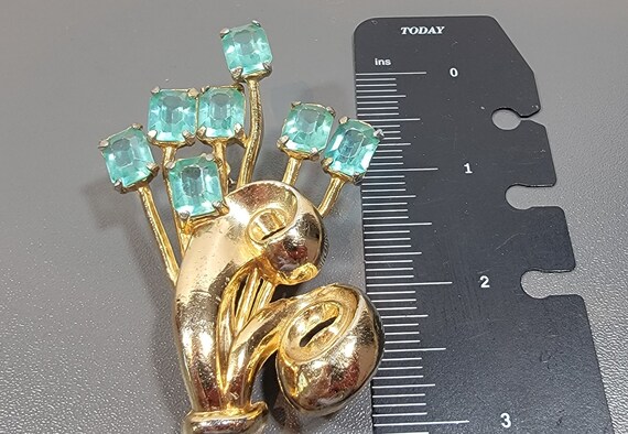 retro style brooch floral bouquet gold tone metal blue aqua stones