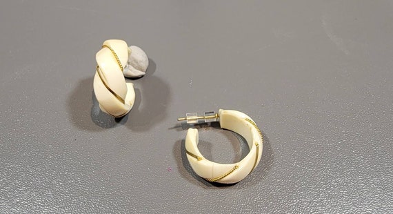Hoop earrings gold tone metal white resin carved