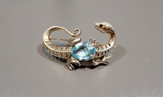 reja sterling brooch lizard with a blue stone belly