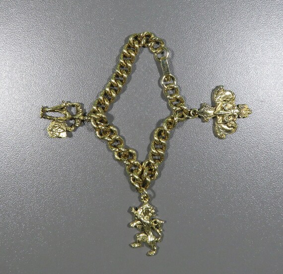 charm bracelet gold links royalty lion knight fleur de lys