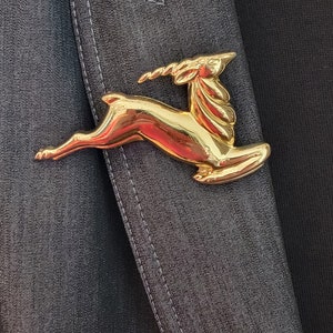 gazelle brooch sterling silver vintage monet