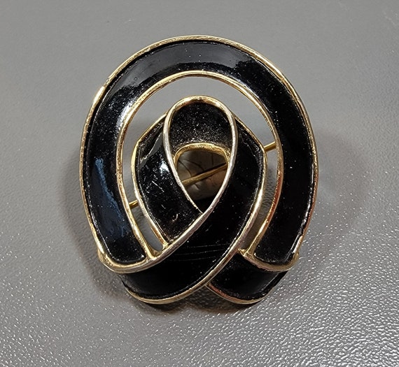Trifari brooch black enamel fancy knot
